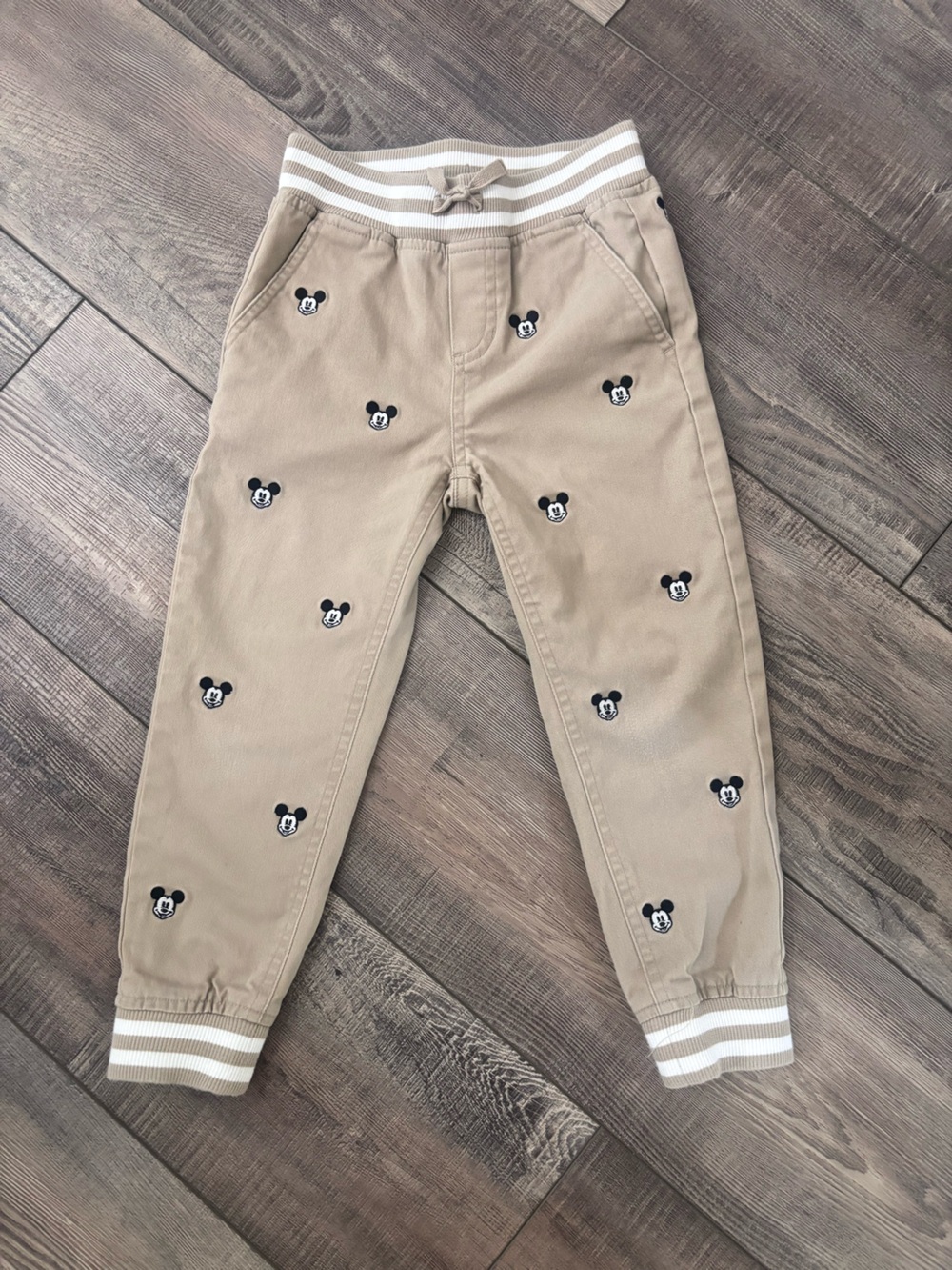 Disney by Janie and Jack Tan Jogger Pants with Embroidered Mickey Icons
